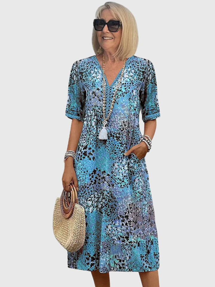 Amy | Chic Printed Holiday Dress with Crochet-Trim V-Neckline