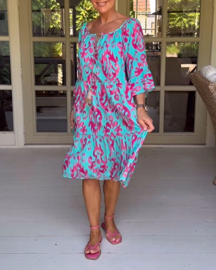 Donna | Graceful Tiered Holiday Dress with Bell Sleeves