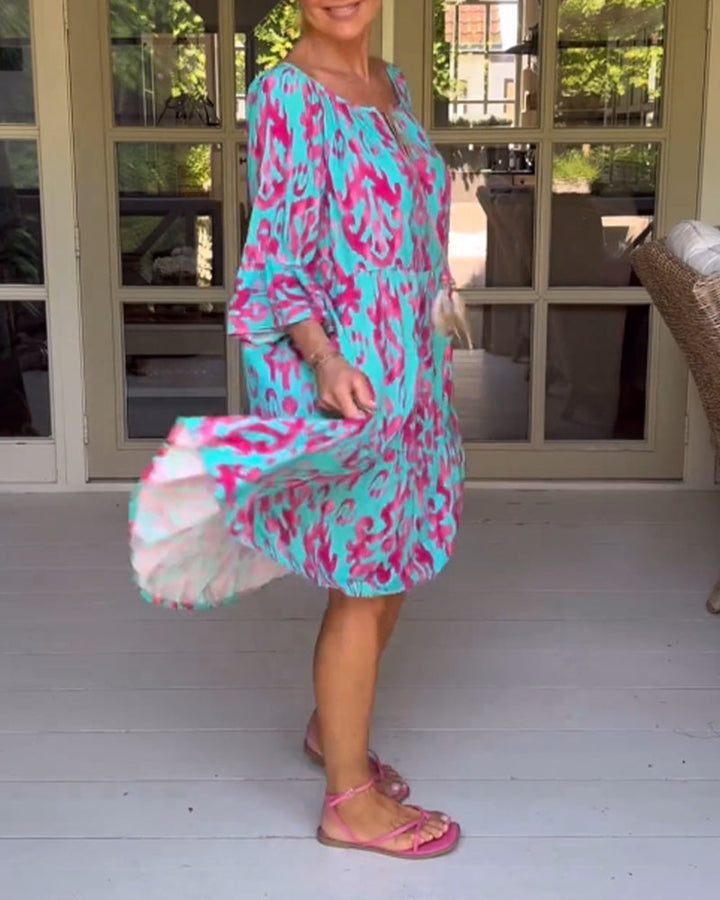 Donna | Graceful Tiered Holiday Dress with Bell Sleeves