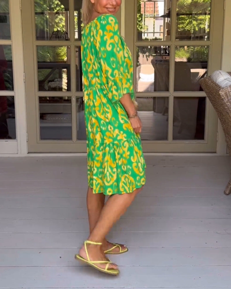 Donna | Graceful Tiered Holiday Dress with Bell Sleeves